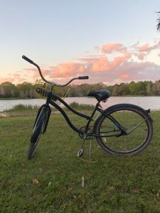 a bicycle parked on a field