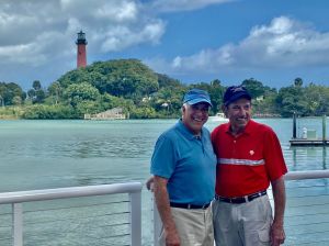 Joe Namath standing next to a body of water