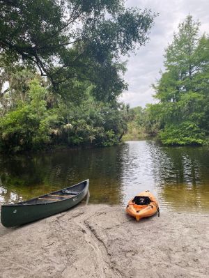 a small boat in a body of water
