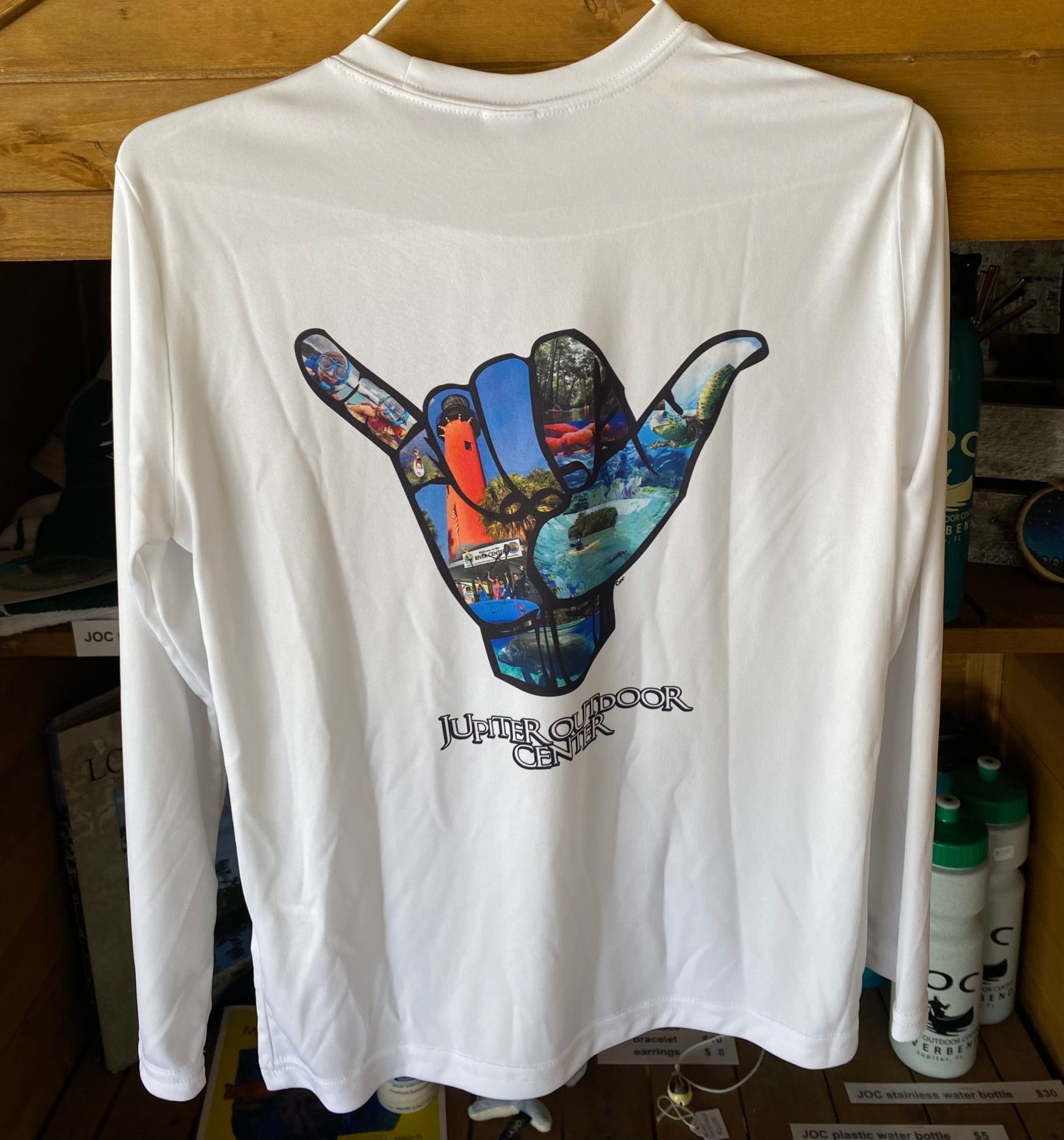 a bed with a white shirt