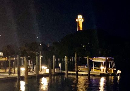 a boat docked at night