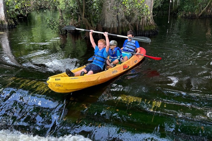 a small boat in a body of water